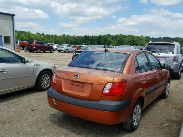 KNADE223696533399 - 2009 KIA RIO BASE ORANGE photo 4