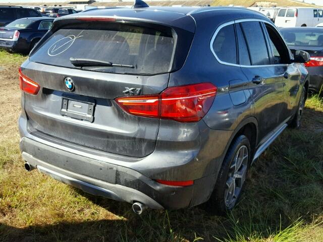 WBXHT3C31G5E56853 - 2016 BMW X1 XDRIVE2 BLACK photo 4