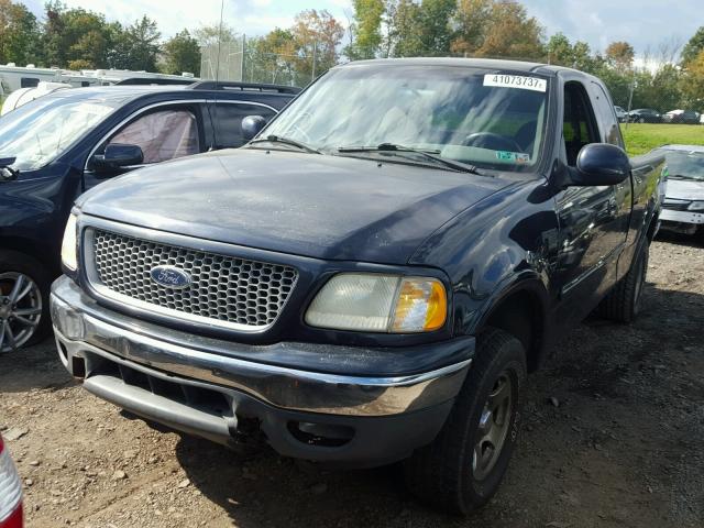 1FTRX18L0XNB61341 - 1999 FORD F150 BLUE photo 2