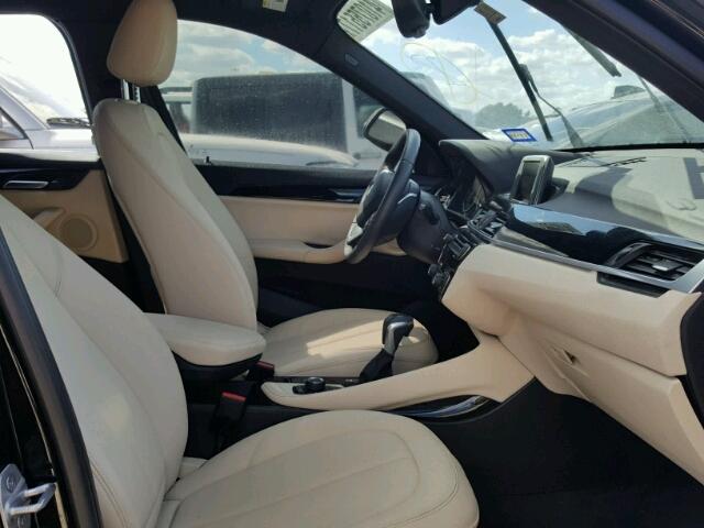 WBXHT3Z32G4A51579 - 2016 BMW X1 XDRIVE2 Negro foto 5