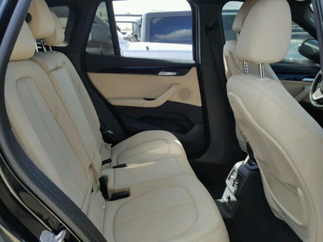 WBXHT3Z32G4A51579 - 2016 BMW X1 XDRIVE2 Negro foto 6