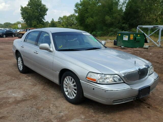 1LNHM81W84Y687854 - 2004 LINCOLN TOWN CAR E SILVER photo 1