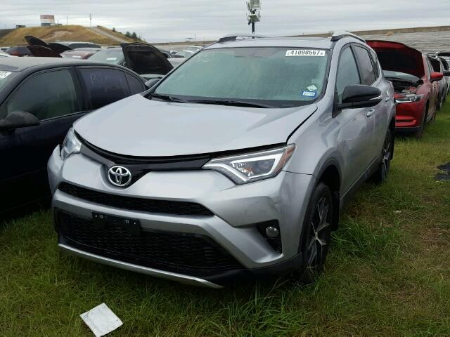 2T3NFREV4GW292321 - 2016 TOYOTA RAV4 SILVER photo 2