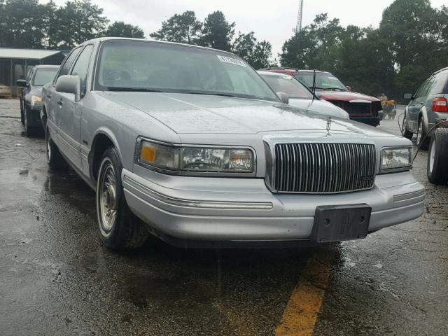 1LNLM81W9VY739911 - 1997 LINCOLN TOWN CAR E SILVER photo 1