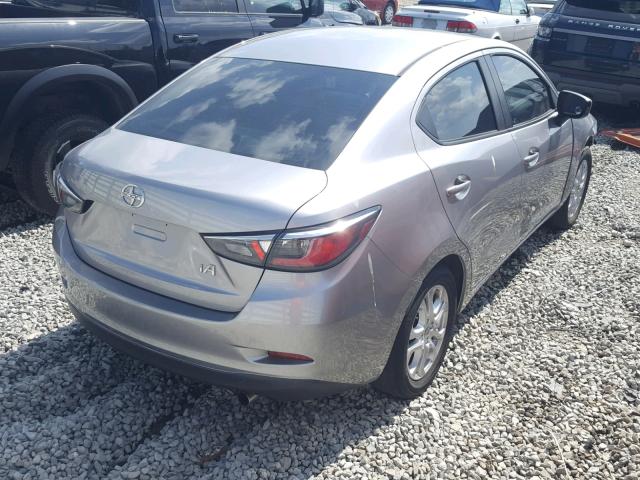 3MYDLBZV0GY136472 - 2016 TOYOTA SCION IA SILVER photo 4