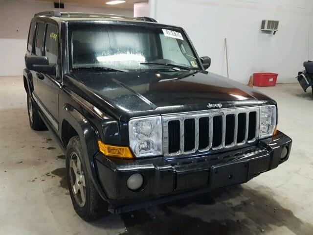 1J4RG4GK7AC128960 - 2010 JEEP COMMANDER BLACK photo 1