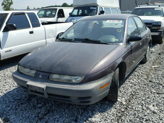 1G8ZG5284XZ174480 - 1999 SATURN SL1 GRAY photo 2