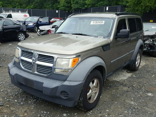 1D8GU28K27W554489 - 2007 DODGE NITRO SXT TAN photo 2