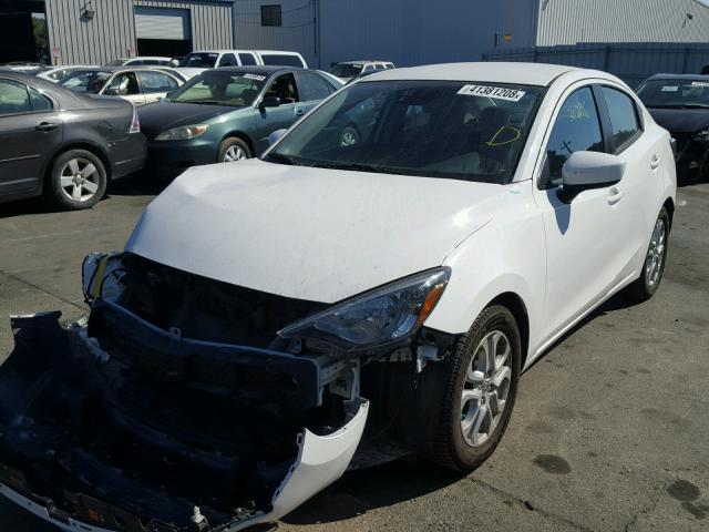 3MYDLBZV9GY140911 - 2016 TOYOTA SCION IA WHITE photo 2