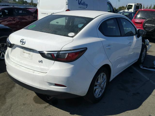 3MYDLBZV9GY140911 - 2016 TOYOTA SCION IA WHITE photo 4