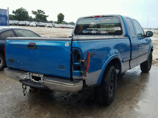 1FTFX28W8VNC71554 - 1997 FORD F250 TURQUOISE photo 4