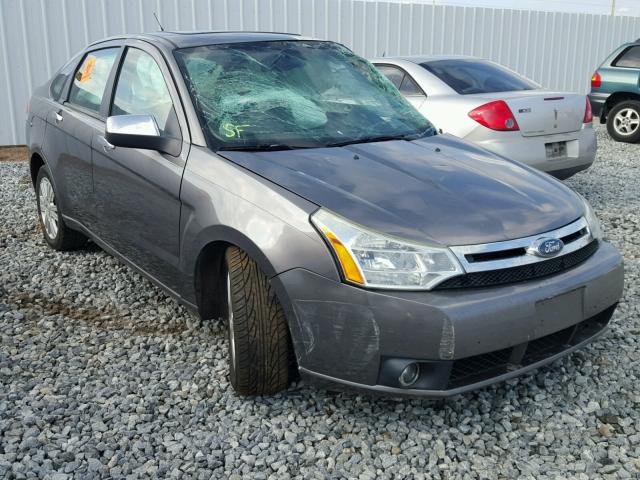 1FAHP3HNXAW195156 - 2010 FORD FOCUS GRAY photo 1