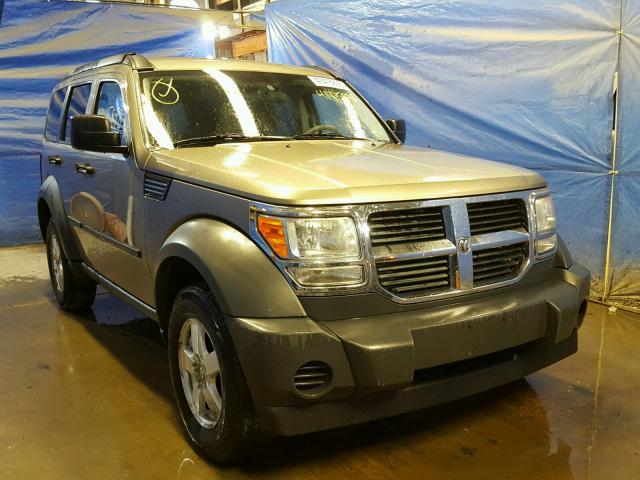 1D8GU28K87W532609 - 2007 DODGE NITRO SXT GOLD photo 1