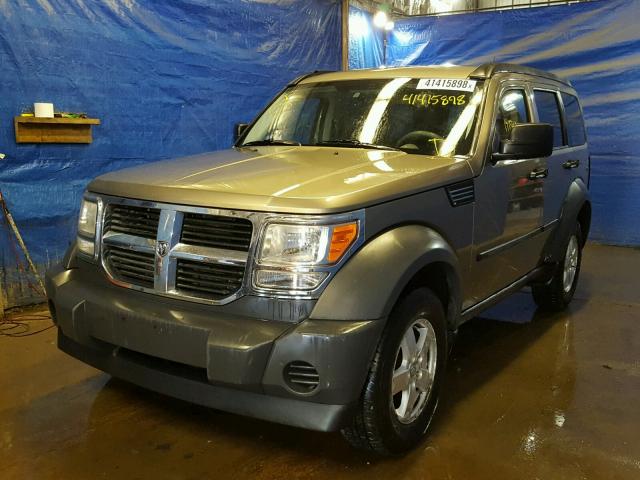 1D8GU28K87W532609 - 2007 DODGE NITRO SXT GOLD photo 2