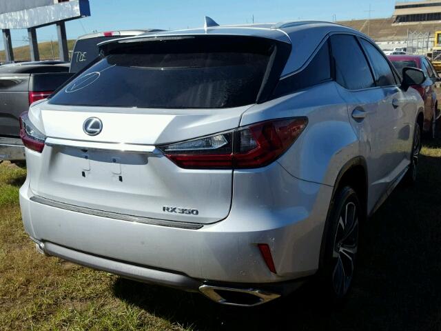 2T2ZZMCA2HC070427 - 2017 LEXUS RX SILVER photo 4