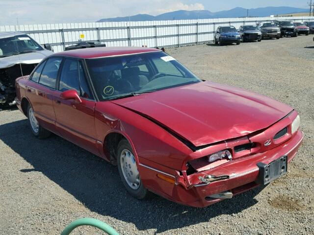 1G3HN52K1X4829114 - 1999 OLDSMOBILE 88 BASE RED photo 1