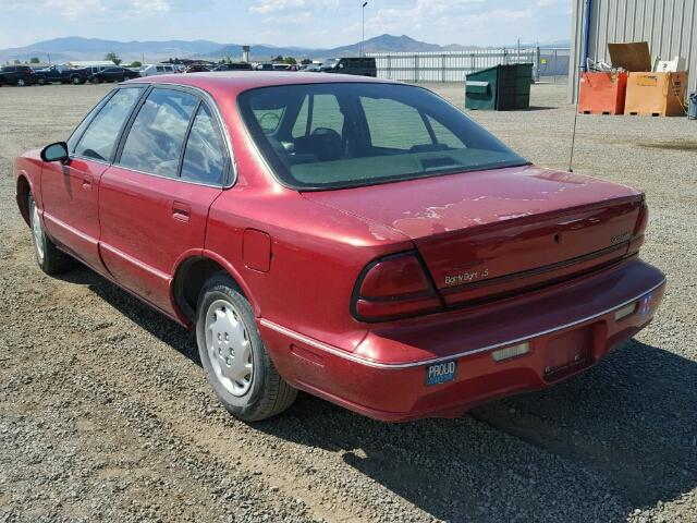 1G3HN52K1X4829114 - 1999 OLDSMOBILE 88 BASE RED photo 3