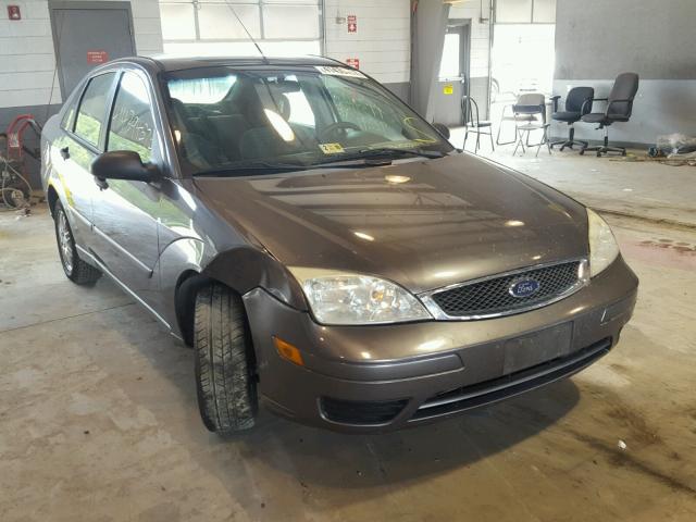 1FAHP34N57W276306 - 2007 FORD FOCUS ZX4 GRAY photo 1