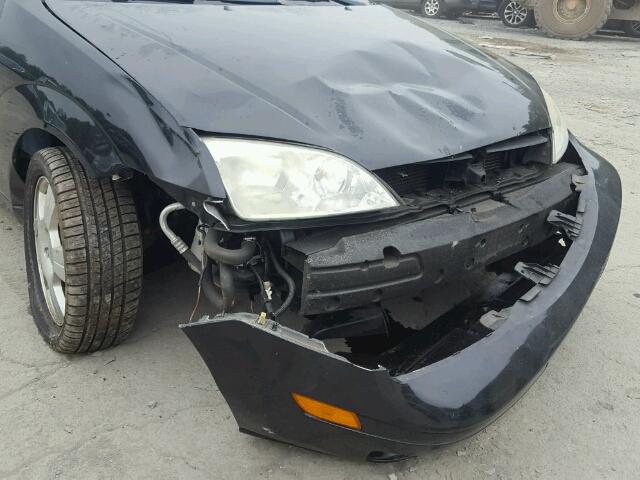 1FAHP37N77W171472 - 2007 FORD FOCUS ZX5 BLACK photo 9