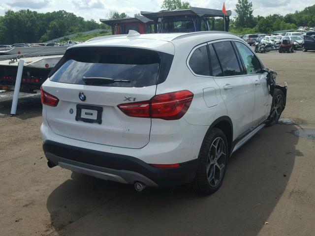 WBXHT3C37H5F69014 - 2017 BMW X1 XDRIVE2 WHITE photo 4