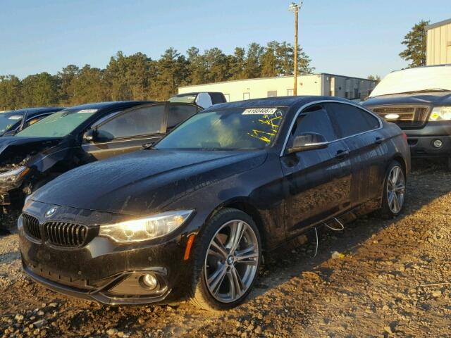 WBA4A9C56GG696369 - 2016 BMW 428 BLACK photo 2