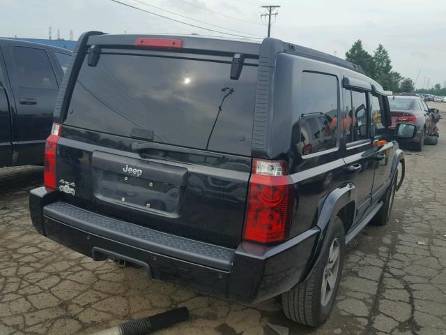 1J8HG48K57C619285 - 2007 JEEP COMMANDER BLACK photo 4