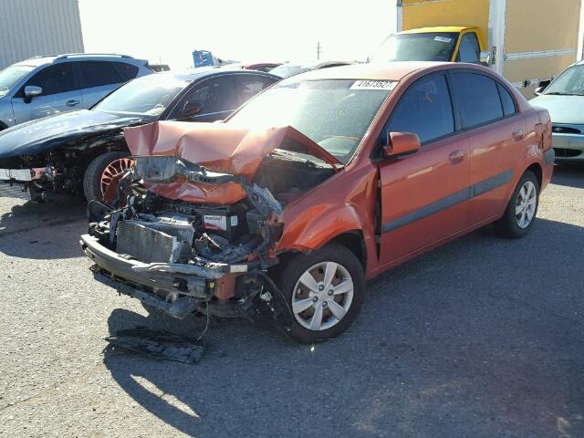 KNADE223296443098 - 2009 KIA RIO BASE ORANGE photo 2