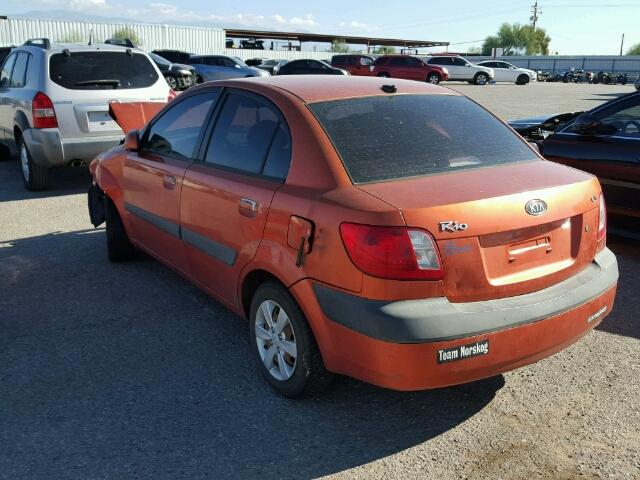 KNADE223296443098 - 2009 KIA RIO BASE ORANGE photo 3