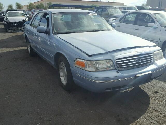 2FAFP74W2XX124916 - 1999 FORD CROWN VICT BLUE photo 1