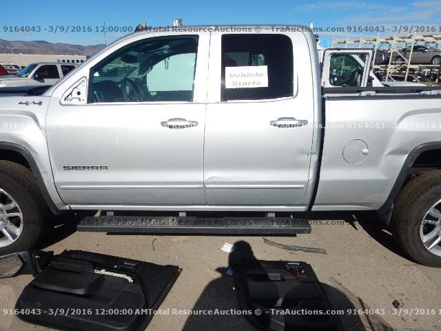 1GTV2UEC3FZ297912 - 2015 GMC SIERRA K15 SILVER photo 4