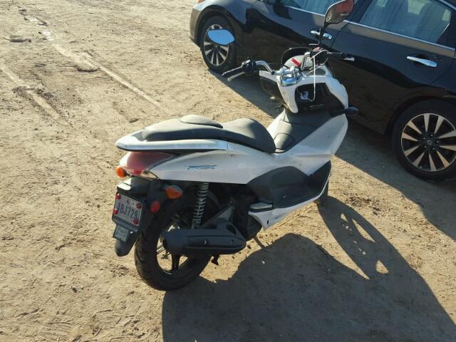 MLHJF2801B5000451 - 2011 HONDA PCX WHITE photo 4