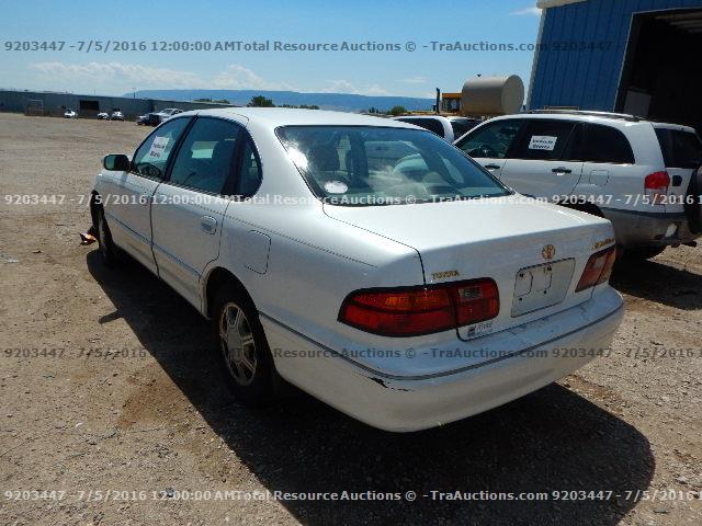 4T1BF18BXWU270644 - 1998 TOYOTA AVALON XL/ WHITE photo 4