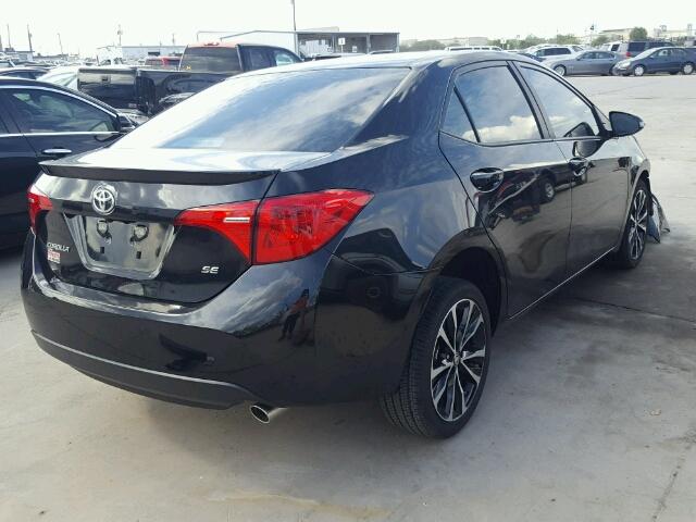 5YFBURHE0HP677245 - 2017 TOYOTA COROLLA L BLACK photo 4