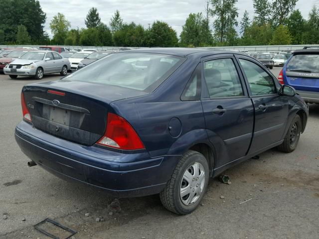 1FAFP33P72W214358 - 2002 FORD FOCUS LX BLUE photo 4