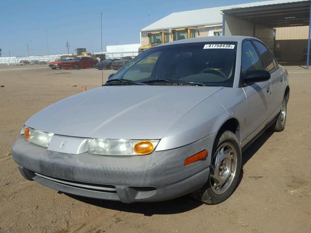 1G8ZF5285YZ122540 - 2000 SATURN SL SILVER photo 2