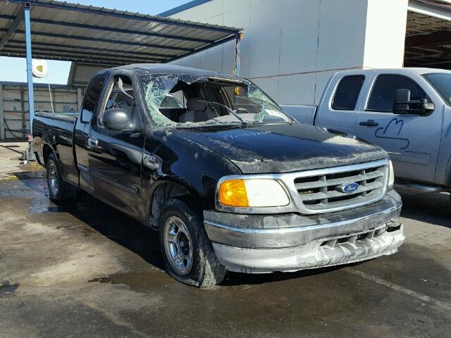 2FTRX17W74CA66868 - 2004 FORD F-150 HERI BLACK photo 1