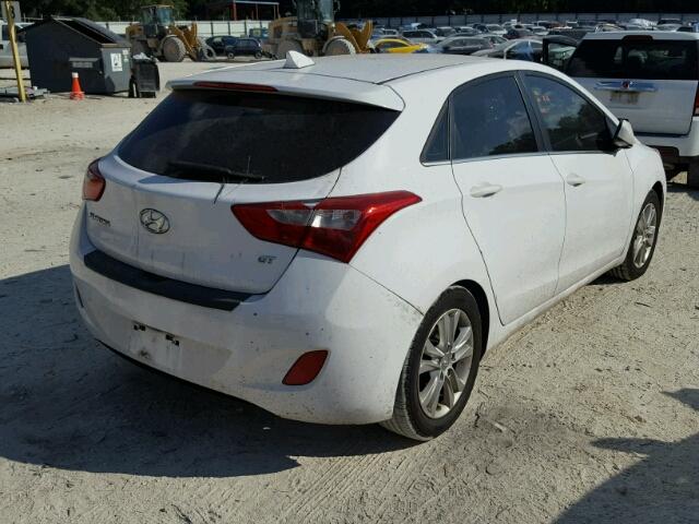 KMHD35LE6DU109716 - 2013 HYUNDAI ELANTRA GT WHITE photo 4