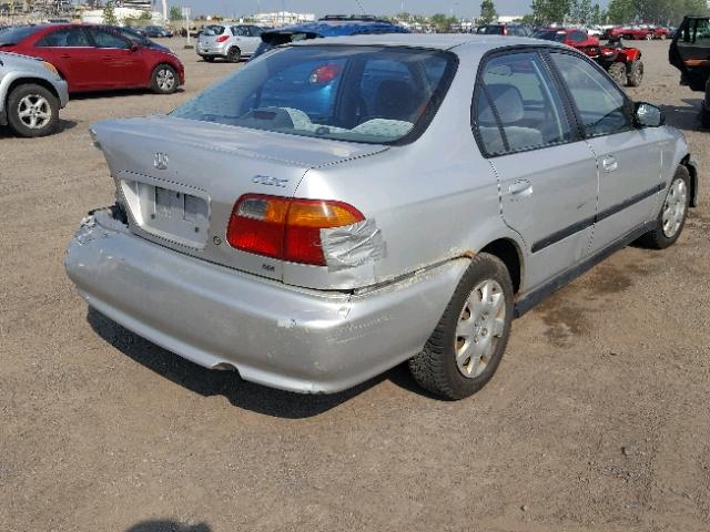 2HGEJ6616YH913134 - 2000 HONDA CIVIC BASE SILVER photo 4