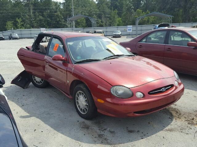 1FAFP53SXXA231014 - 1999 FORD TAURUS SE RED photo 1