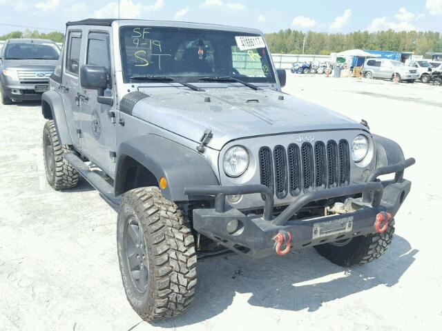 1C4BJWDG2FL635163 - 2015 JEEP WRANGLER U SILVER photo 1