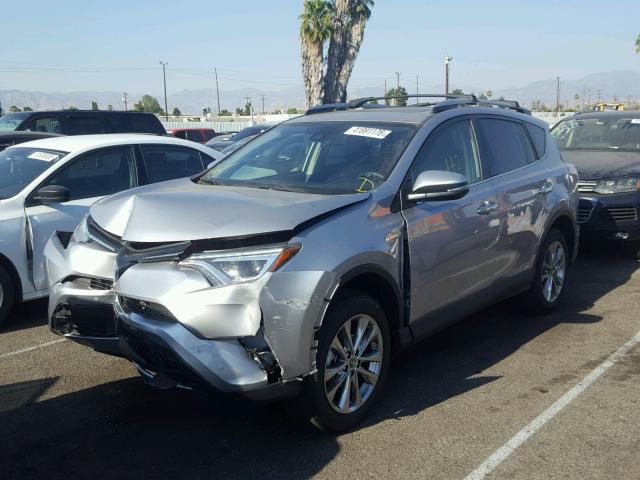 JTMDJREV7JD174844 - 2018 TOYOTA RAV4 HV LI SILVER photo 2