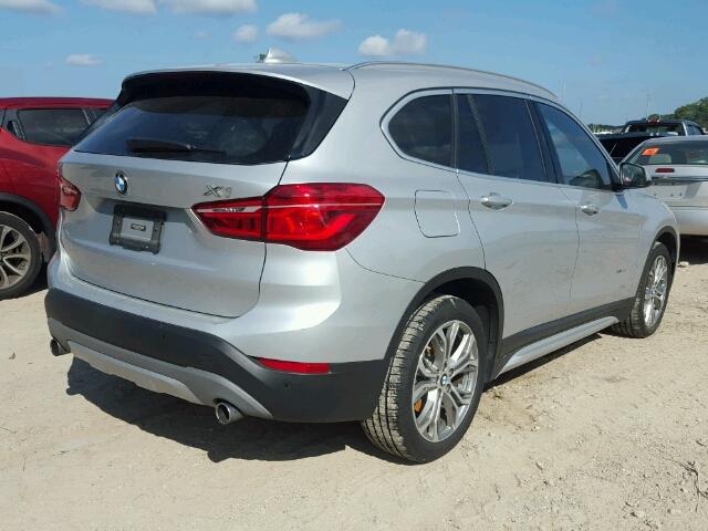 WBXHT3C38GP885859 - 2016 BMW X1 XDRIVE2 SILVER photo 4