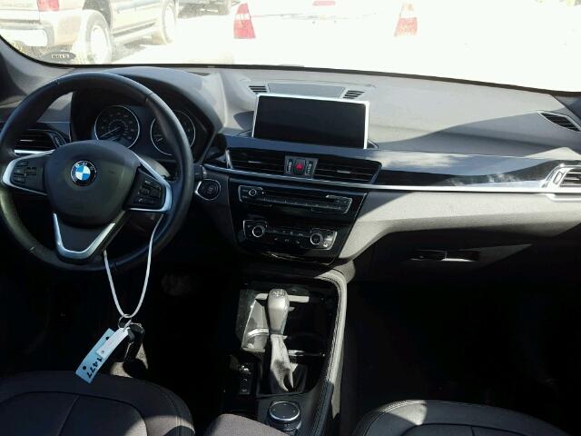 WBXHT3C38GP885859 - 2016 BMW X1 XDRIVE2 SILVER photo 9