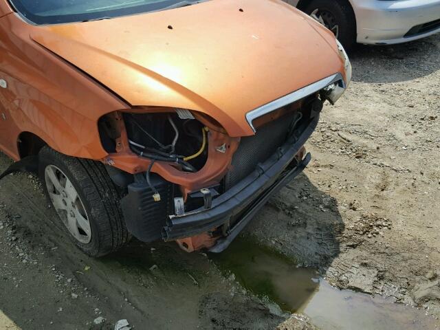 KL1TD56637B064548 - 2007 CHEVROLET AVEO BASE Նարնջագույն լուսանկար 9