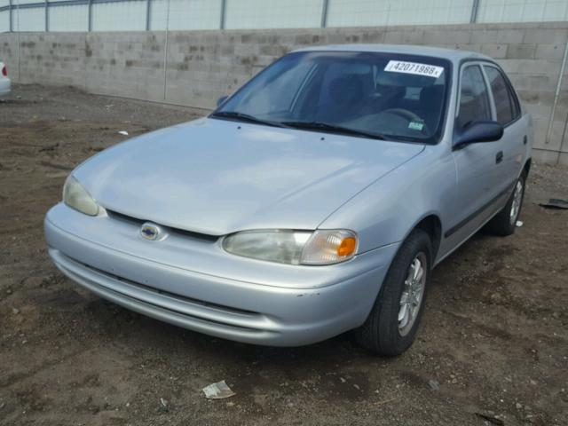 1Y1SK5282YZ434930 - 2000 CHEVROLET GEO PRIZM SILVER photo 2