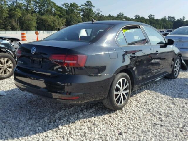 3VWD67AJ5GM254937 - 2016 VOLKSWAGEN JETTA BLACK photo 4