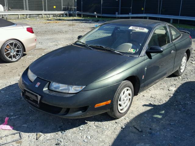 1G8ZE1282XZ196069 - 1999 SATURN SC1 GREEN photo 2