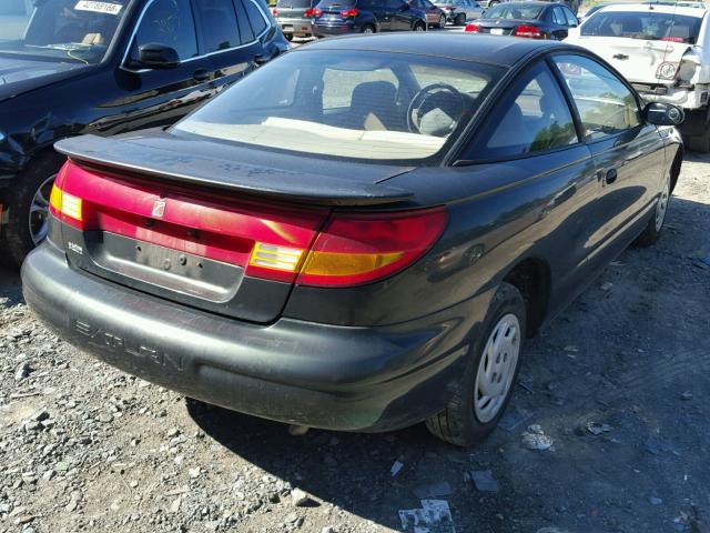 1G8ZE1282XZ196069 - 1999 SATURN SC1 GREEN photo 4