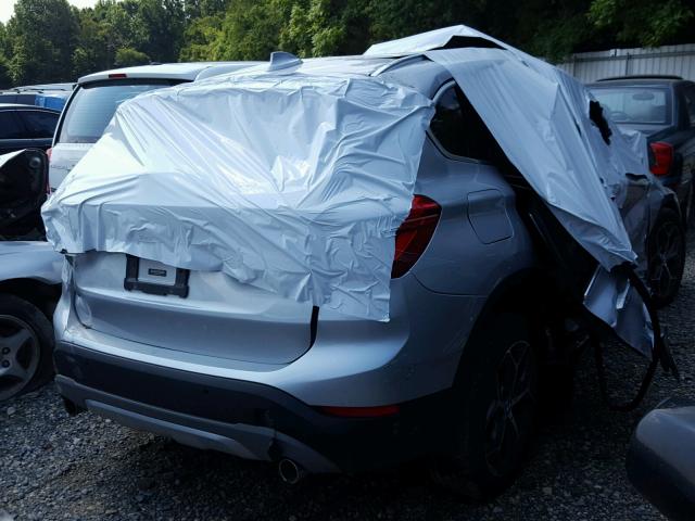 WBXHT3Z39H4A56344 - 2017 BMW X1 XDRIVE2 SILVER photo 4