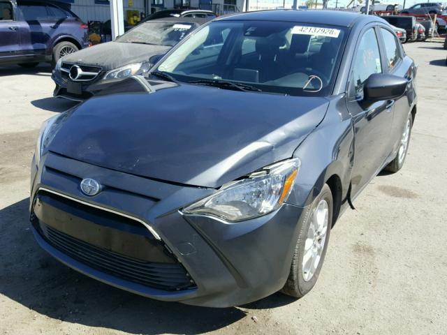 3MYDLBZV9GY115894 - 2016 TOYOTA SCION IA GRAY photo 2
